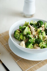 Tumis brokoli or stir fry sauteed spicy broccoli served in a bowl
