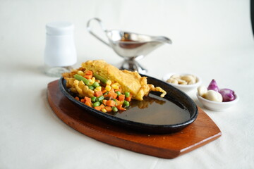 Homemade Country Fried Steak with vegetables and Potatoes