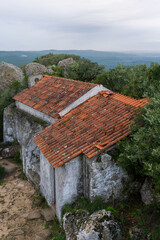 Fototapeta na wymiar An old chapel with a red tiled roof on St. Blaise hill near Nazare