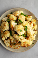 Homemade Roasted White Cauliflower on a Plate, top view.