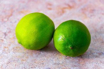 Green ripe lime lime citrus fruit on the table in Mexico.