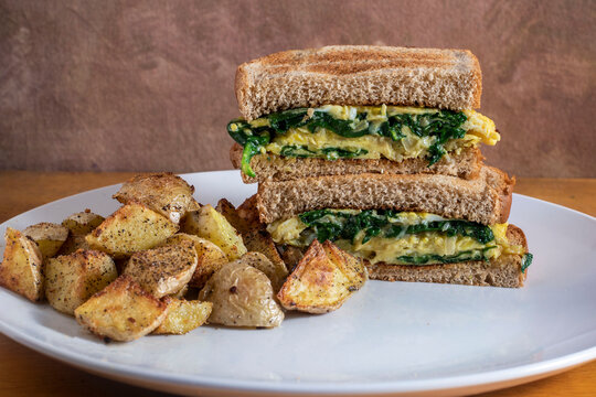 Scrambled Egg And Spinach Sandwich  With Home Fries