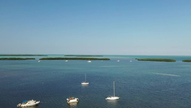 Aerial of Boats and Sailboats in anchor in Islamorada, Florida Keys