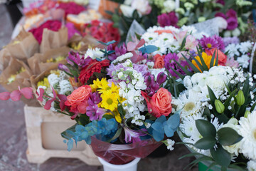 Colorful bouquets at flower shop for sale. Romantic gifts for holidays.