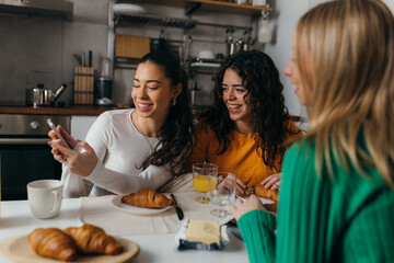 Three women are having brunch together