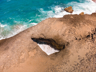 Pozo de jacinto puerto rico big ground hole in the coast drone shot