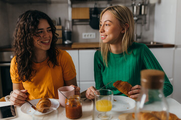 Two women are having breakfast together