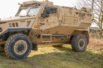 Obraz premium close-up of a British army Foxhound 4x4-wheel drive protected patrol vehicle on a military exercise, Wiltshire UK