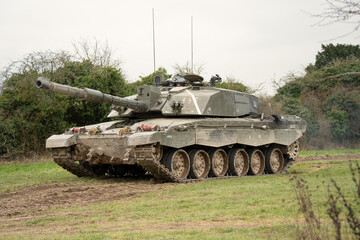close-up of a British army FV4034 Challenger 2 ii main battle tank in action on a military combat...