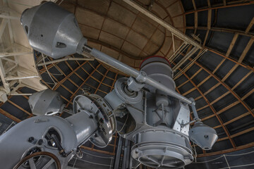 historic telescope in an observatory