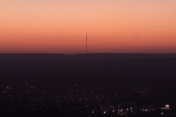 Sunset with radio tower on the horizon