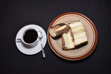 roasted sweet potato and a glass of coffee, a typical Indonesian snack menu