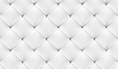 White natual leather background for the wall in the room. Interior design, headboards made of artificial leather, leatherette , furniture upholstery. Classic checkered pattern for furniture, headboard