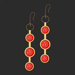 Gold earrings with red stone on black