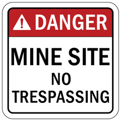 Active mine site warning sign and labels no trespassing