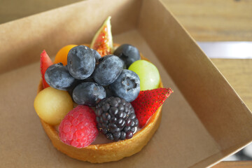 berry fruit tart in a take away packet 