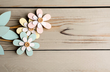Fototapeta na wymiar Wood crafts on the table. DIY flowers