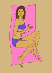 Woman lying on beach towel in summer
