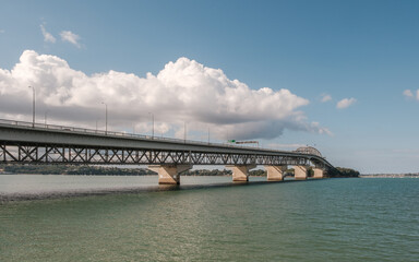 The Auckland Harbour Bridge, an eight-lane motorway bridge joining St Marys Bay and Northcote over Waitemata Harbour in New Zealand
