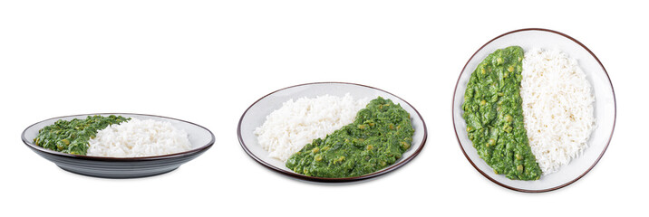 Spinach dahl with rice in a plate on a white isolated background