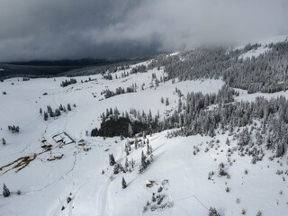 Fototapeta na wymiar Aerial winter view of Rila mountain near Belmeken Dam, Bulgaria