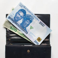 The new Nigerian 1000 Naira note in a wallet, Nigeria's new currency