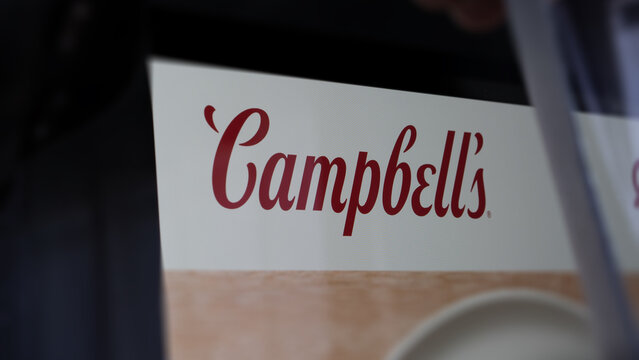 February 15 2023, New York. An investor looking at the Campbell Soup Company CPB news . A screen shows the brand Campbell Soup Company news to invest