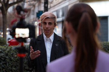 Interview with white Caucasian businessman with dyed hair