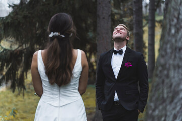 Bride and Groom first look at the autumn park. High quality photo