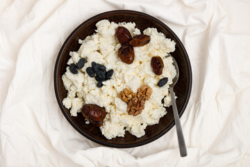 Cottage cheese with dried fruits.