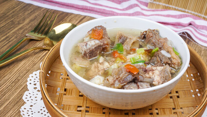 Soup, Sop Daging is Indonesian traditional food, served in a bowl.