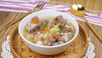Soup, Sop Daging is Indonesian traditional food, served in a bowl.