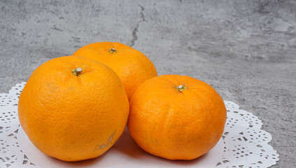 Healthy fruits, orange fruits background three orange fruits