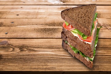 Tasty fresh sandwich with cheese and vegetables