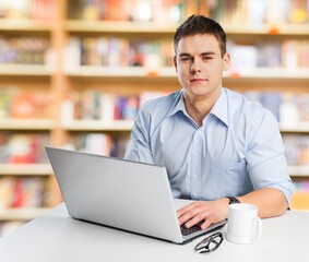 Young smart business man worker with laptop