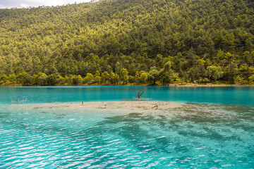 Blue moon valley in lijiang city ,China. It at the foot of Jade Dragon Snow Mountain, gets the name because White Water River flowing through like a blue crescent in the sunlight.Blue moon valley in l