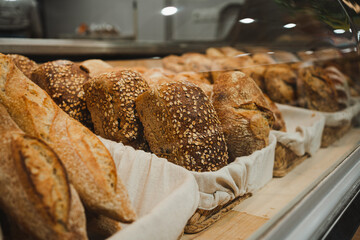Shot of seed tin loaf bread displayed to public in artisan bakery