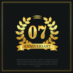 07 year anniversary celebration logo gold color design on black background abstract illustration  