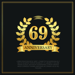 69 year anniversary celebration logo gold color design on black background abstract illustration  