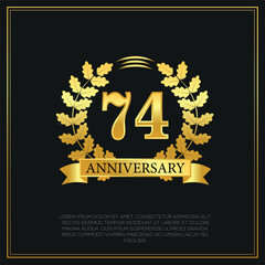 74 year anniversary celebration logo gold color design on black background abstract illustration  