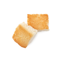 Delicious crispy croutons on white background, top view