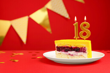 Coming of age party - 18th birthday. Delicious cake with number shaped candles on red background, space for text