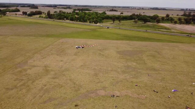 A kite in the sky shaped like a stingray during an aeromodeling event in Buenos Aires, Argentina. Drone flight