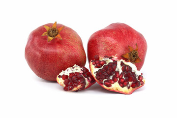 Fresh whole pomegranate fruits isolated on white