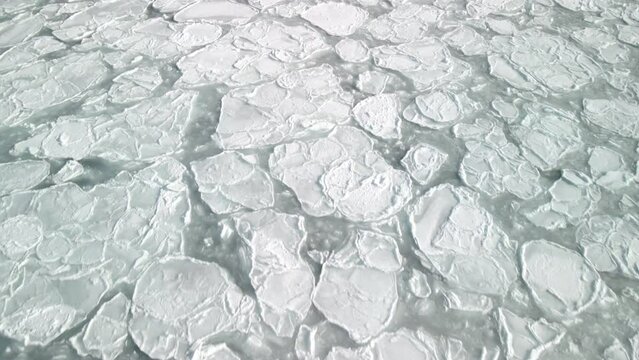 ice cover on the ocean in Perce, quebec during winter.