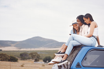 Road trip, car and happy friends with phone, social media update and countryside adventure on sky mockup space. Youth, gen z and diversity women on 5g smartphone and roof for travel journey together