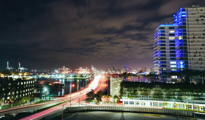 city skyline at night traffic life in miami Florida 
