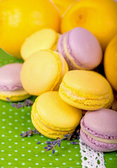 Sweet macaroons on a green napkin, vintage color tone