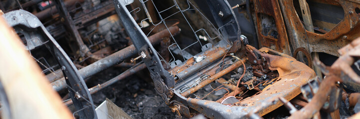 Burnt out passenger car damaged vehicles and auto insurance