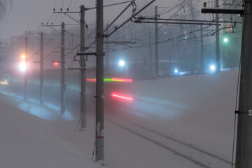 View of a train at night at winter. Long exposure shot.